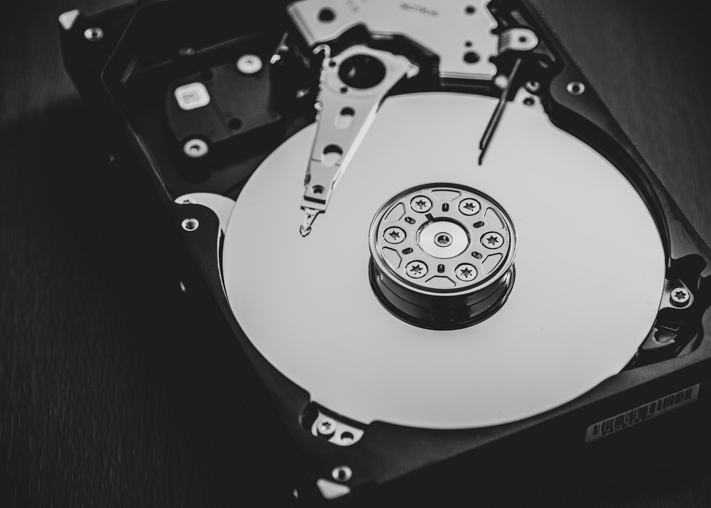 Open hard disk drive showing its internal components